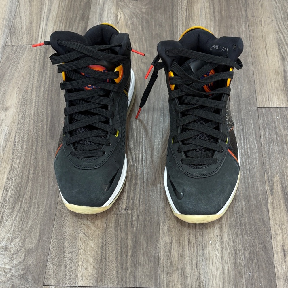 Black High-Top Sneakers with Orange Accents